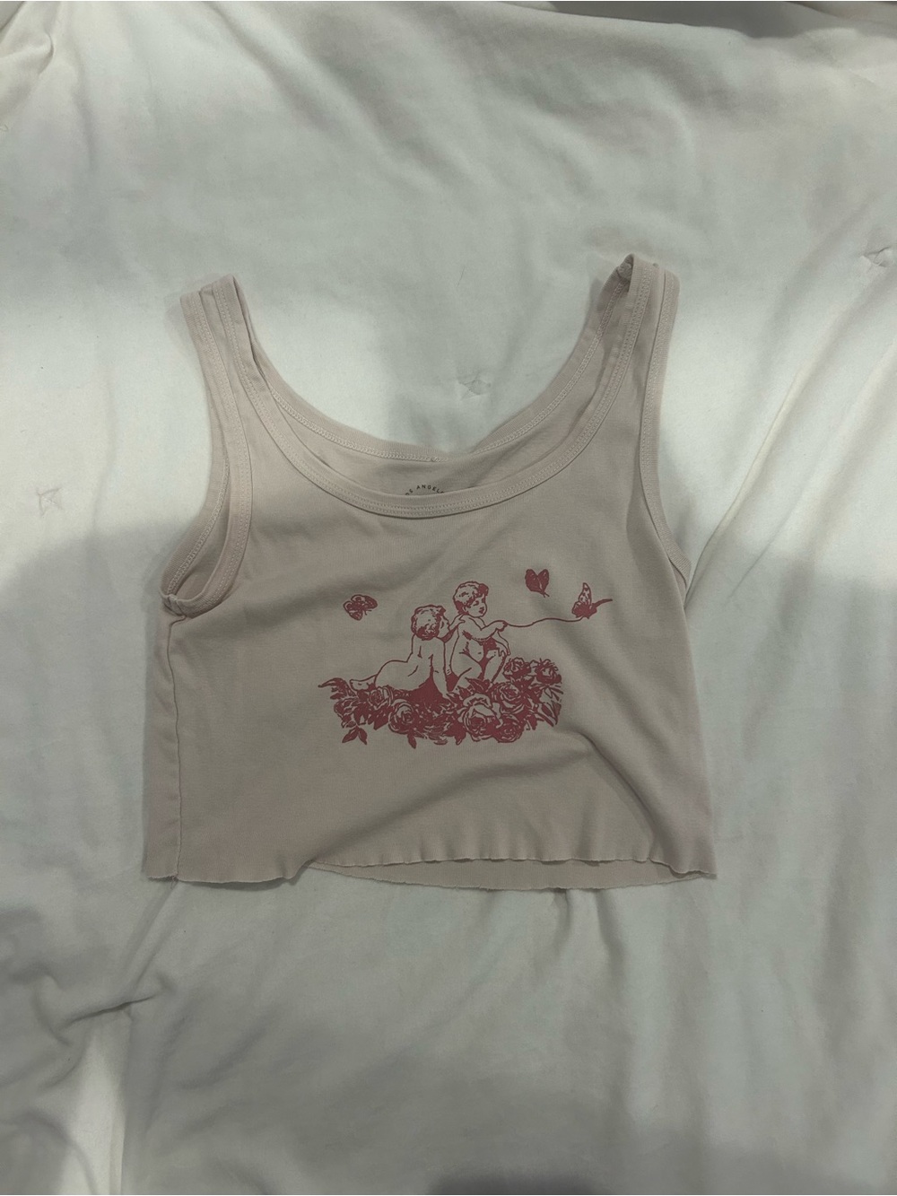 PacSun Light Pink Ribbed Crop Tank with Pink Cherub Graphic